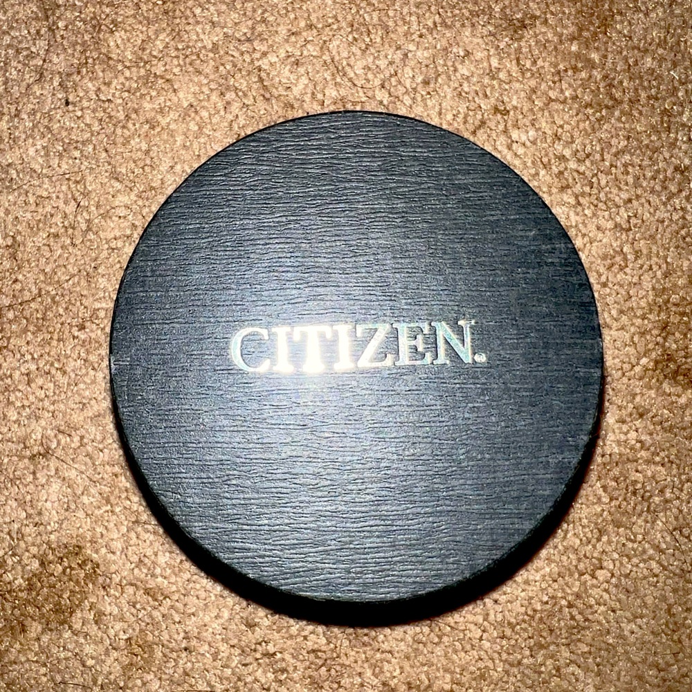 Citizen eco drive watch with beautiful pink face & diamond accents on the bezel